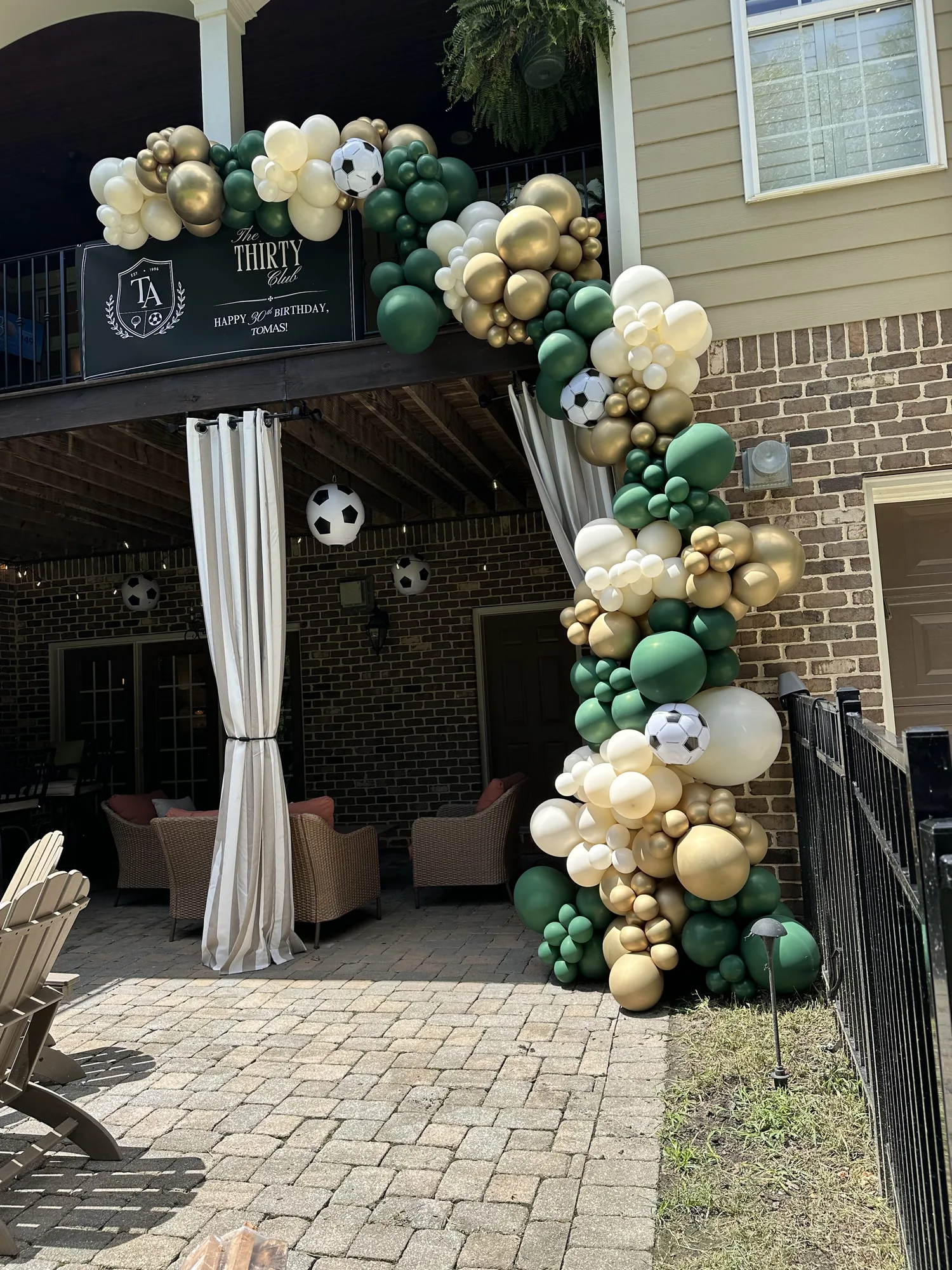 Balloon garland and event decoration by The Party Project - Chattanooga, TN