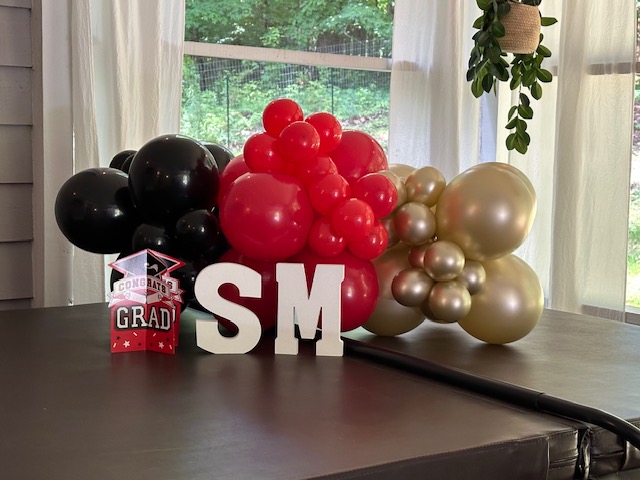 Balloon garland and event decoration by The Party Project - Chattanooga, TN